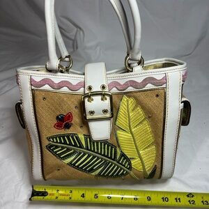 Coach Limited Edition Ladybug and Leaf Hampton
Buckle Tote Bag style number 4439
